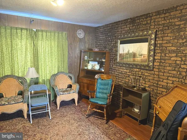 a view of livingroom with furniture window and outdoor view