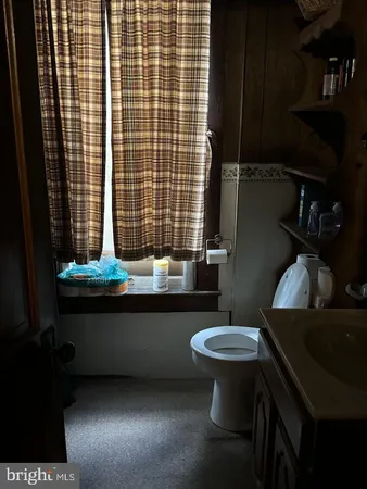 a room with furniture and window