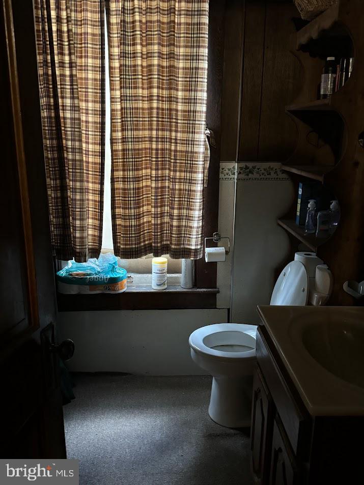 511 Main Street Oakland, MD 21550 - Photo 26 of 35 a bathroom with a sink and a toilet