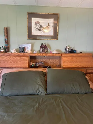 a room with a wooden floor and shoes