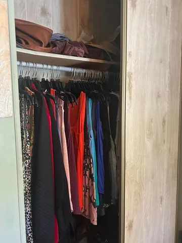 a room with furniture and flat screen tv