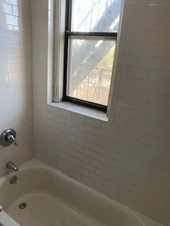 a bathroom with a bathtub