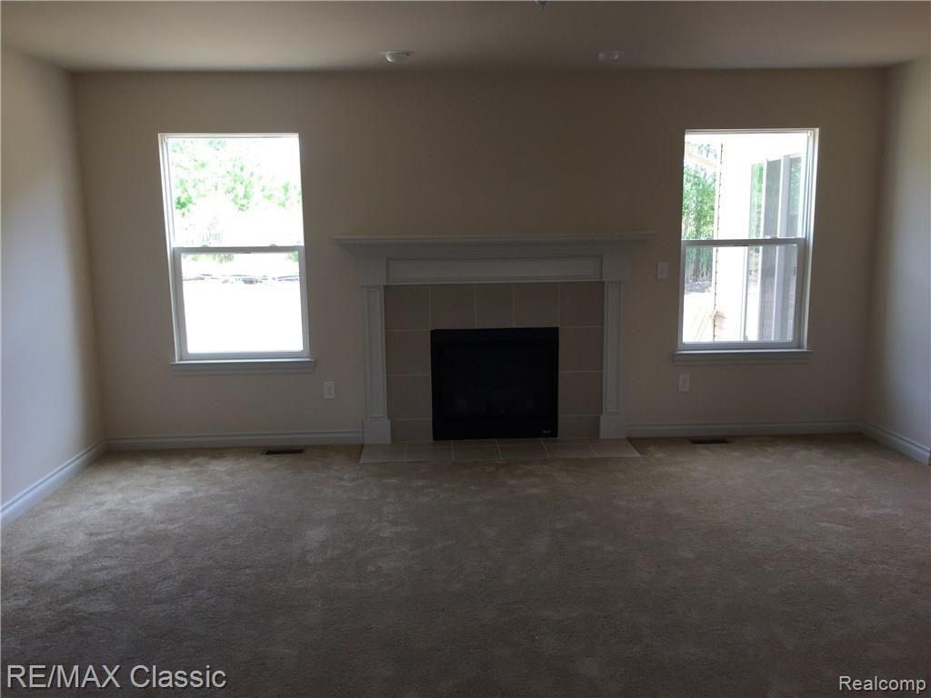 2137 Carson Lane Monroe, MI 48162 - Photo 6 of 30 Family room with optional upgrade fireplace.