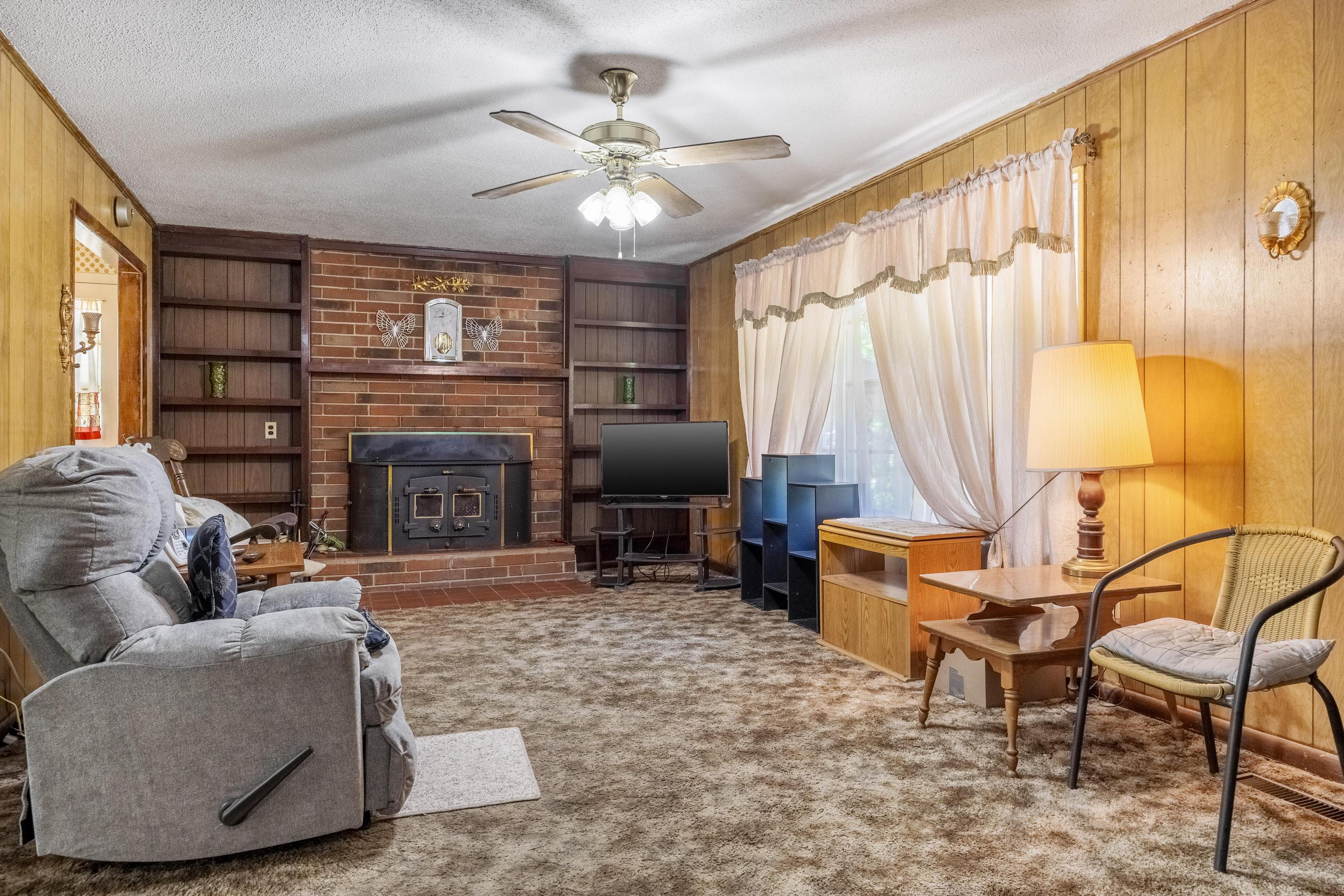 Living Room with Wood burning Fireplace