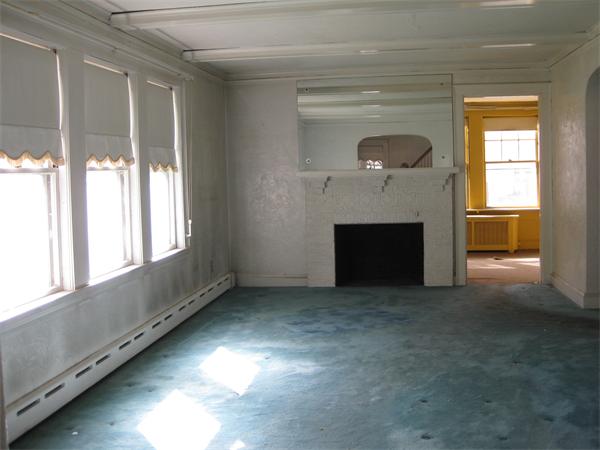 35 Rangeley Road Newton, MA 02465 - Photo 4 of 7 a living room with furniture and a fireplace