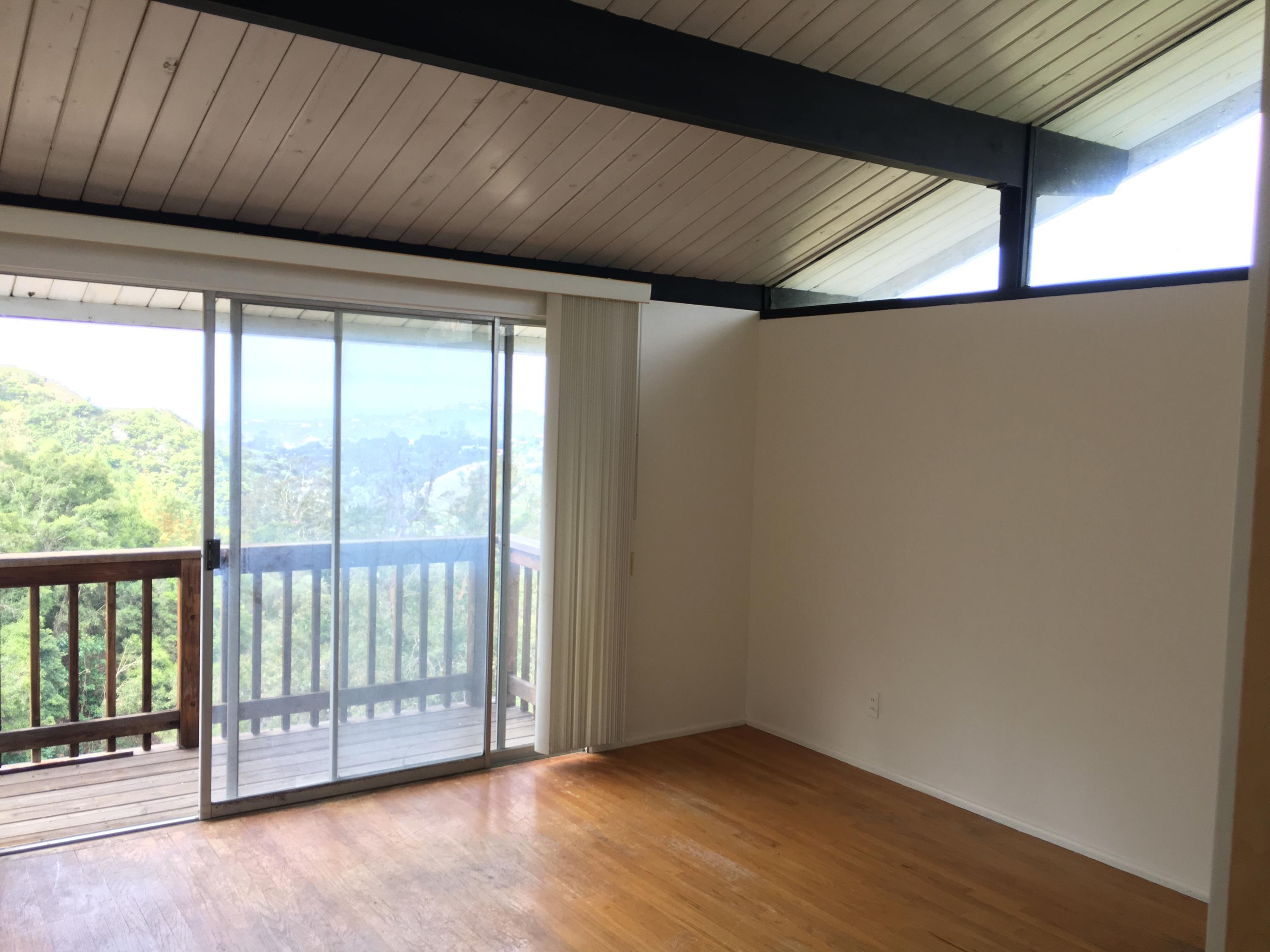 151 Sierra Vista Road Santa Barbara, CA 93108 - Photo 2 of 16 a view of a room with wooden floor and windows