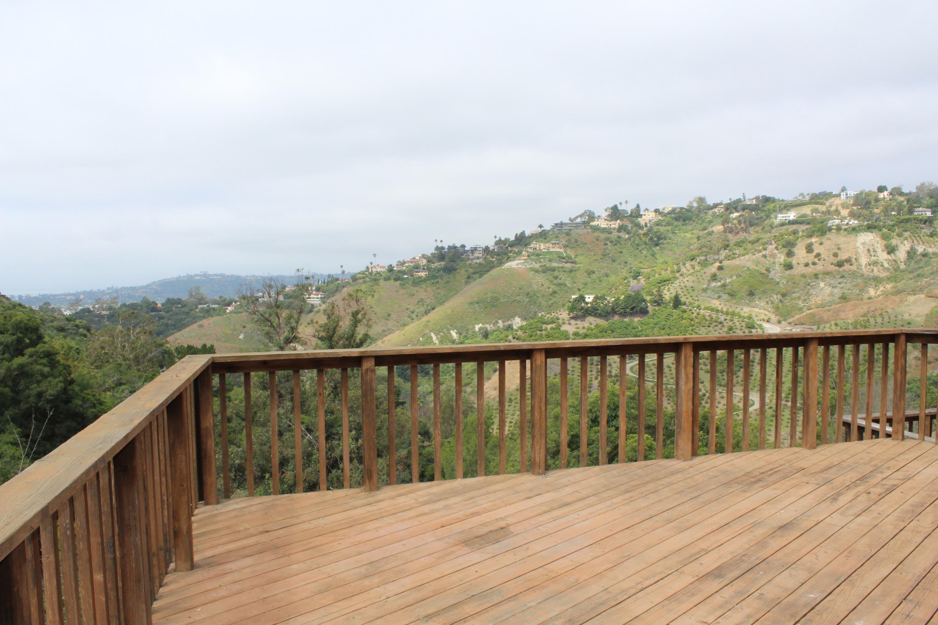 151 Sierra Vista Road Santa Barbara, CA 93108 - Photo 10 of 16 a balcony with an ocean view