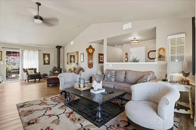 a view of a dining room with furniture and windows