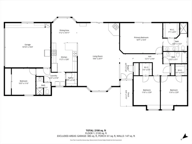 a view of a table and chairs under an umbrella