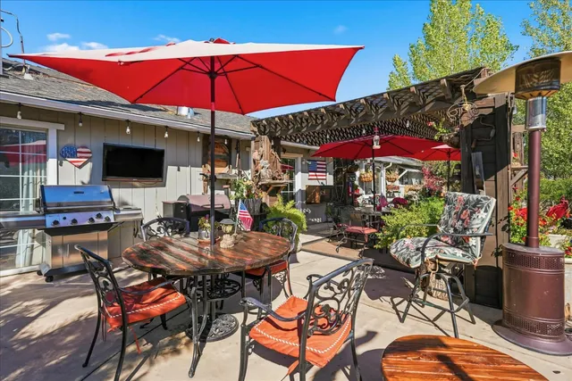 a view of a city with lush green forest