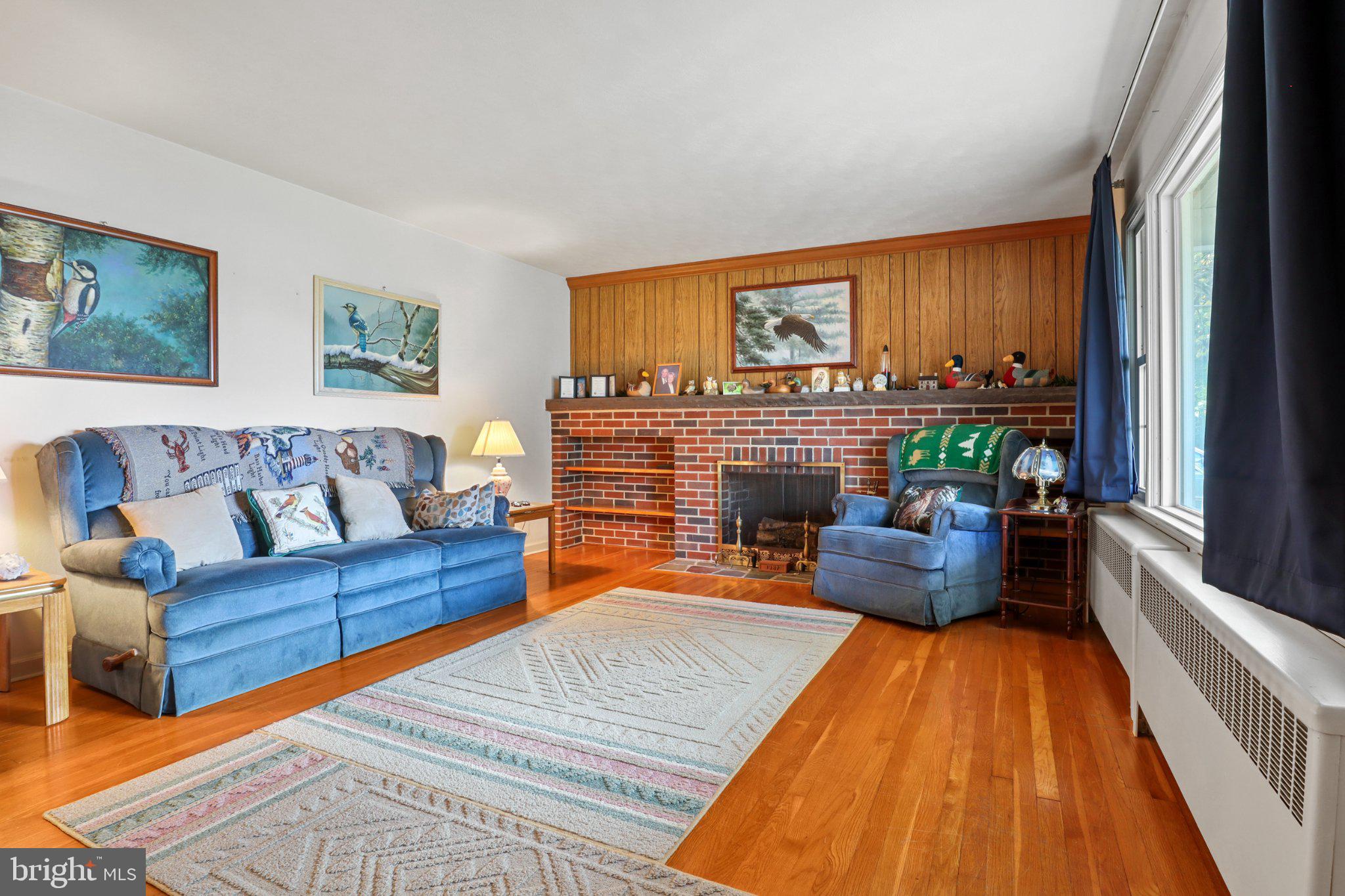 4330 Paradise Road Dover, PA 17315 - Photo 4 of 23 Cozy living room with warm wood accents.