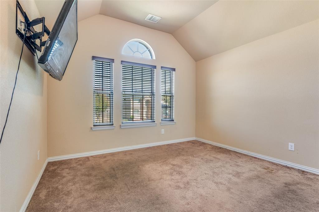 1512 Ruffian Road DeSoto, TX 75115 - Photo 12 of 25 an empty room with windows