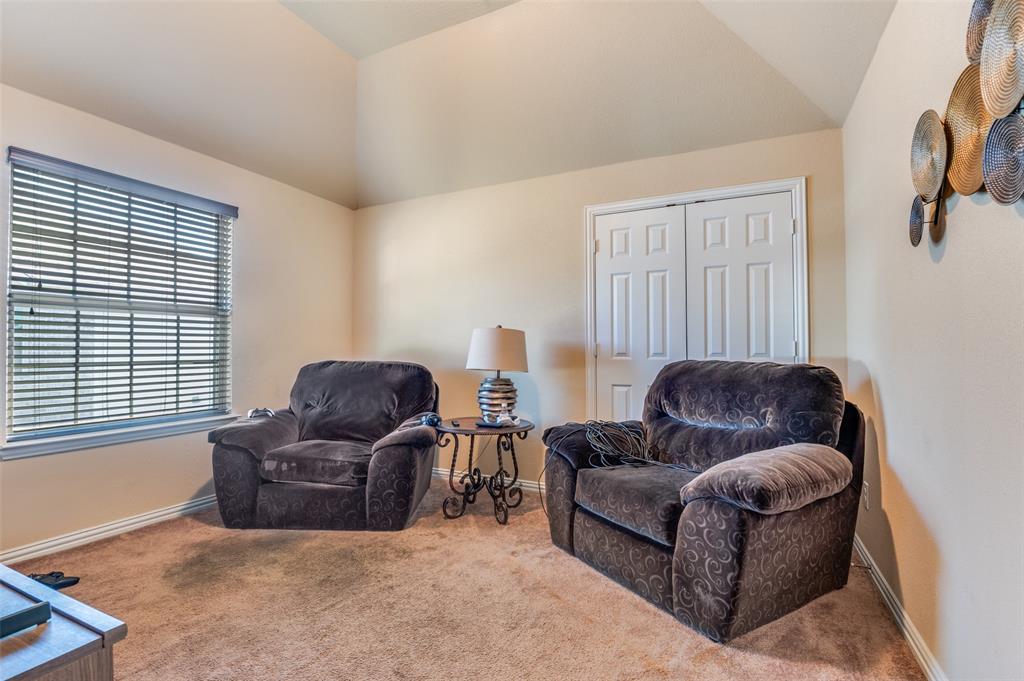 1512 Ruffian Road DeSoto, TX 75115 - Photo 13 of 25 a living room with furniture and a window