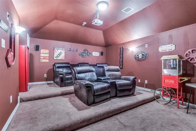 a living room with furniture and lamp