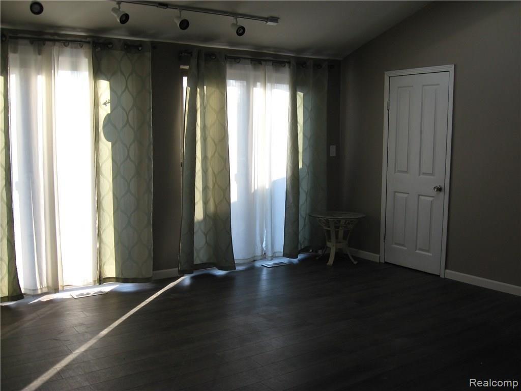 9155 Rucker Road Grosse Ile, MI 48138 - Photo 16 of 31 Door walls in master bedroom