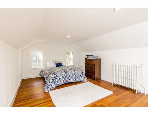 31 Locust Avenue Lexington, MA 02421 - Photo 20 of 30 a bedroom with a bed and a dresser