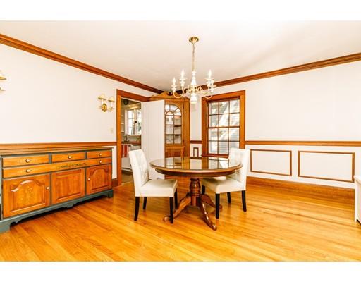 31 Locust Avenue Lexington, MA 02421 - Photo 8 of 30 a view of a dining room with furniture and chandelier