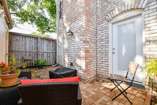 a backyard of a house with seating space