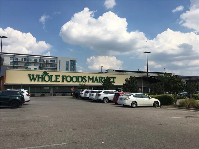 a view of parking with cars parked