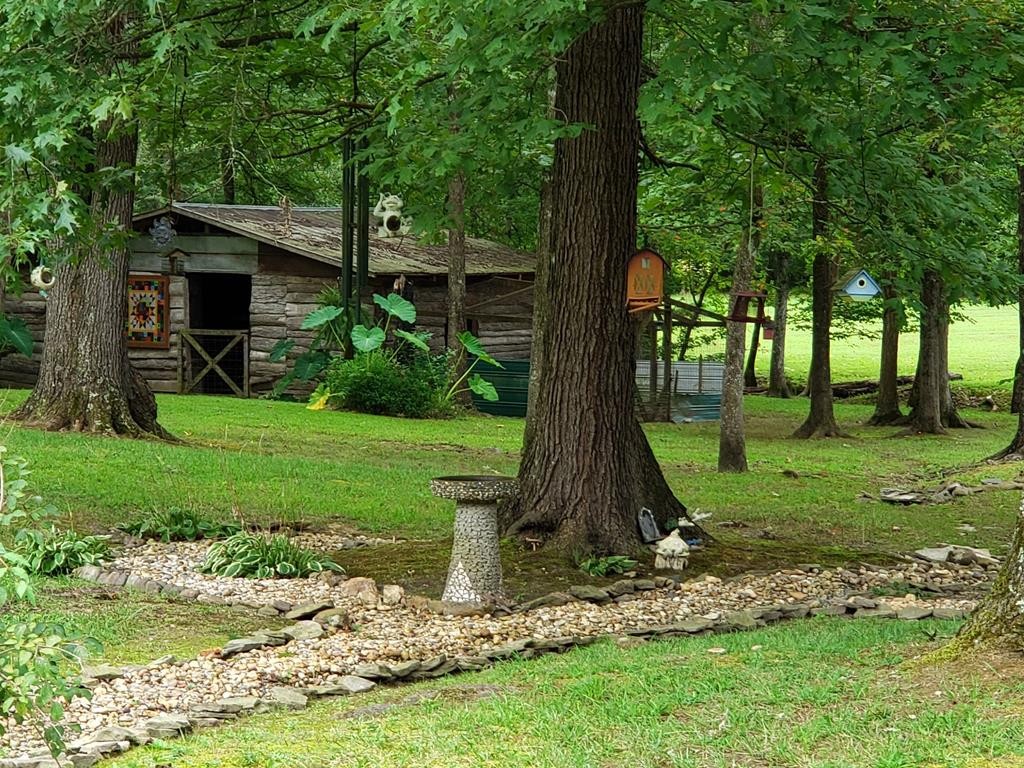 375 Todd Road Southeast Cleveland, TN 37323 - Photo 3 of 47 a view of a garden with a tree