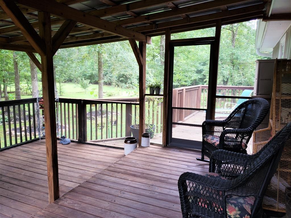 375 Todd Road Southeast Cleveland, TN 37323 - Photo 34 of 47 a view of a balcony with chair and wooden floor