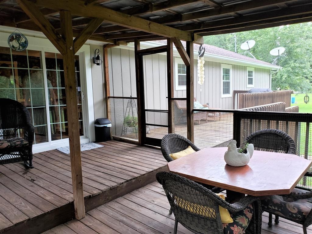 375 Todd Road Southeast Cleveland, TN 37323 - Photo 35 of 47 a outdoor dining space with furniture and wooden floor