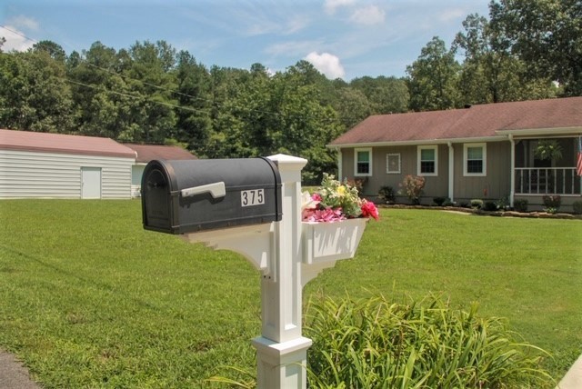 375 Todd Road Southeast Cleveland, TN 37323 - Photo 46 of 47 a front view of a house with garden