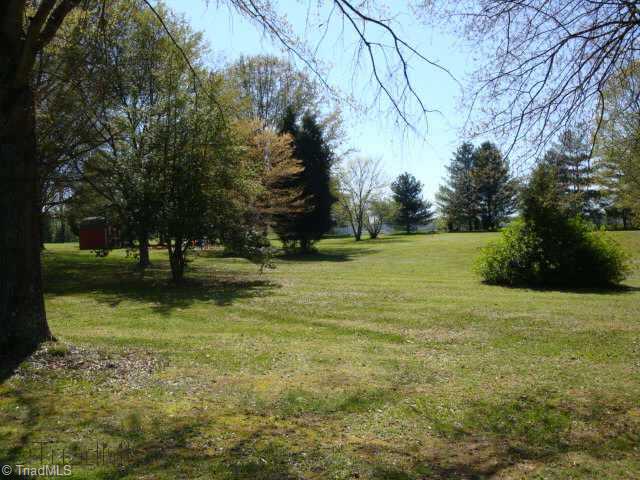 121 Pete Foster Road Mocksville, NC 27028 - Photo 9 of 9 Other. Huge Backyard with 1.63 Acres, Level, Storage Building, Sandbox area for kids