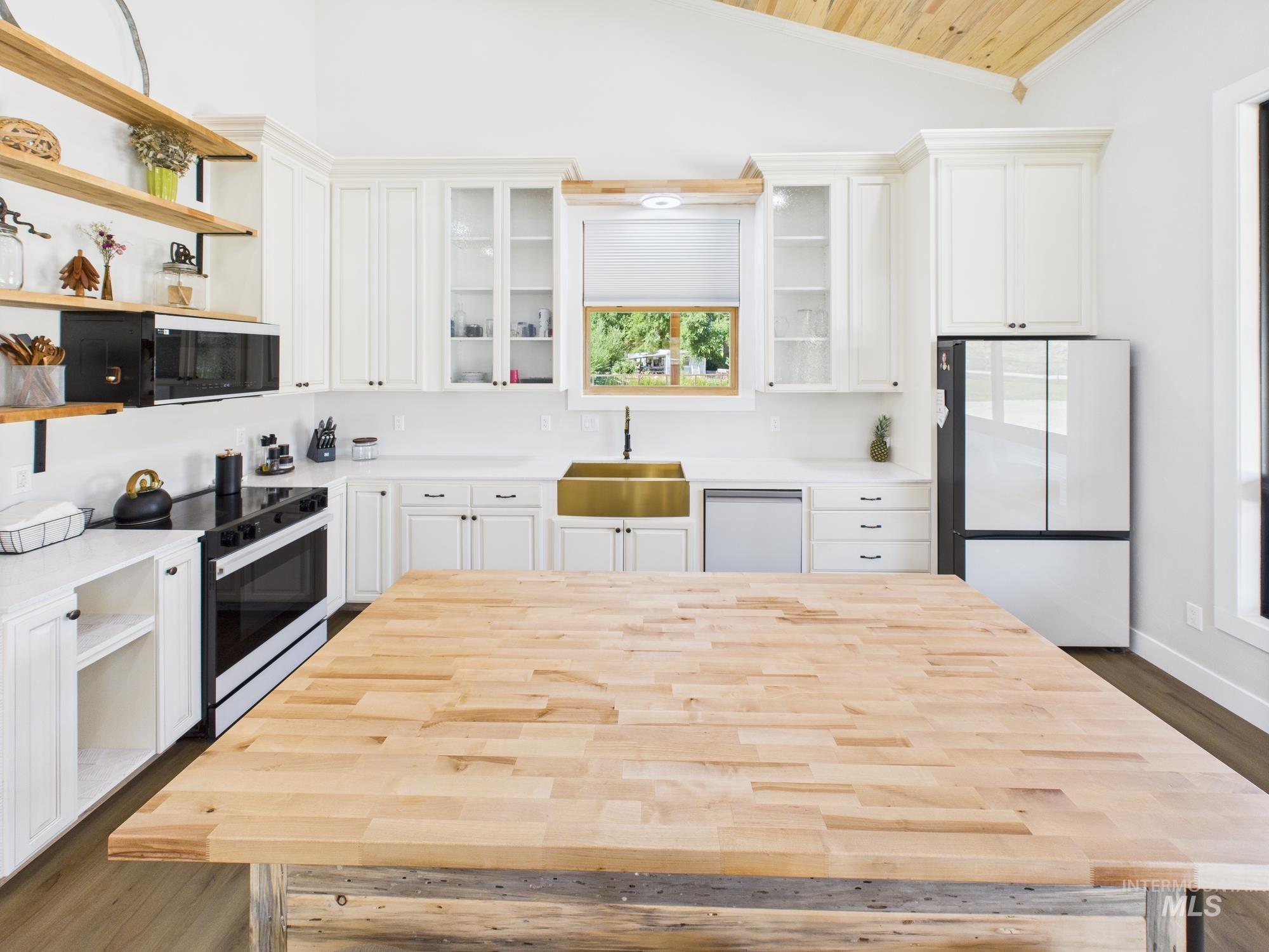 6501 Sweet Ola Highway Sweet, ID 83670 - Photo 12 of 43 Kitchen featuring lofted ceiling, open shelves, dark wood-type flooring, white electric stove, and wooden ceiling