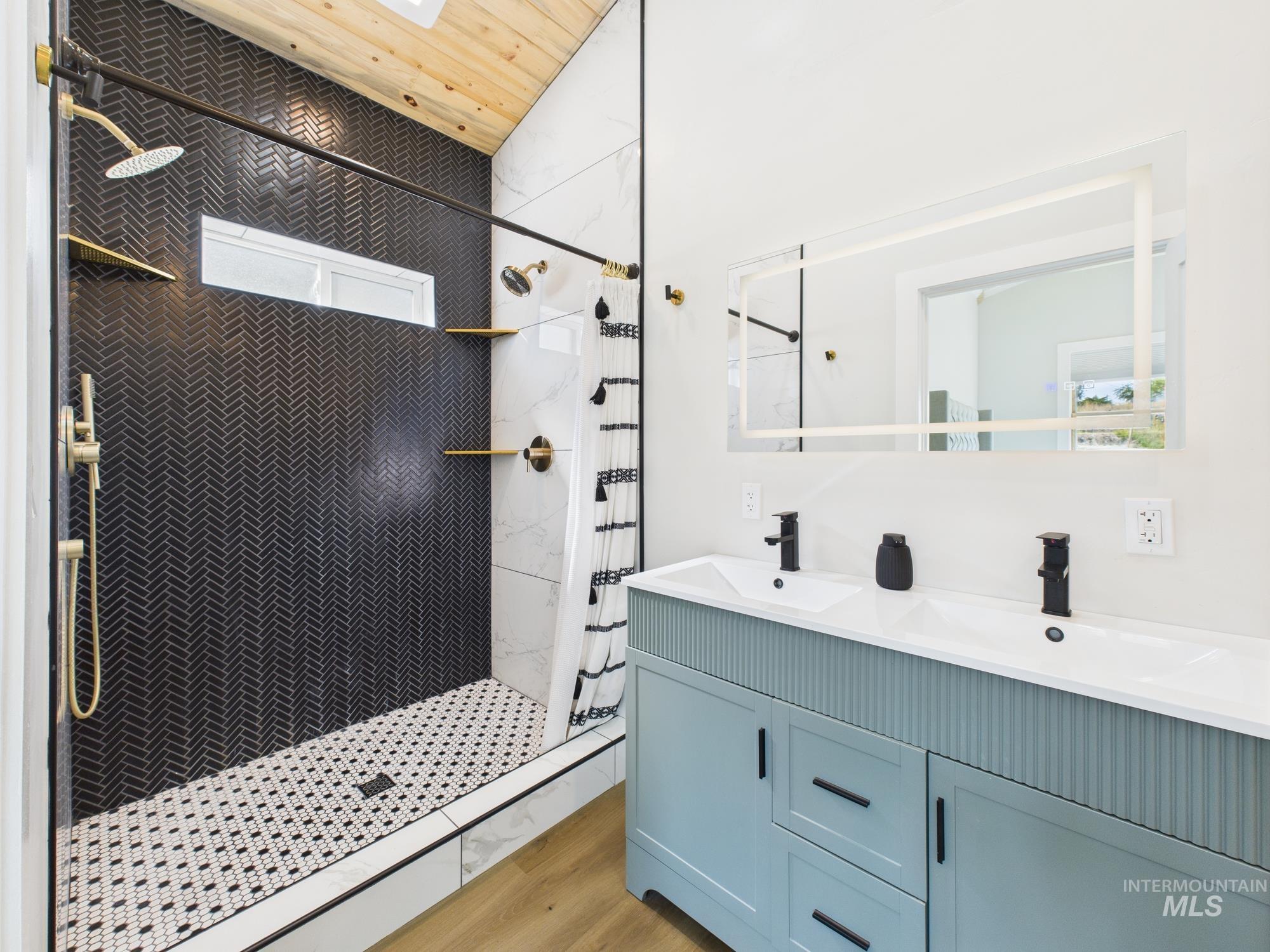 6501 Sweet Ola Highway Sweet, ID 83670 - Photo 19 of 43 Full bathroom featuring a stall shower, double vanity, wood finished floors, and wooden ceiling