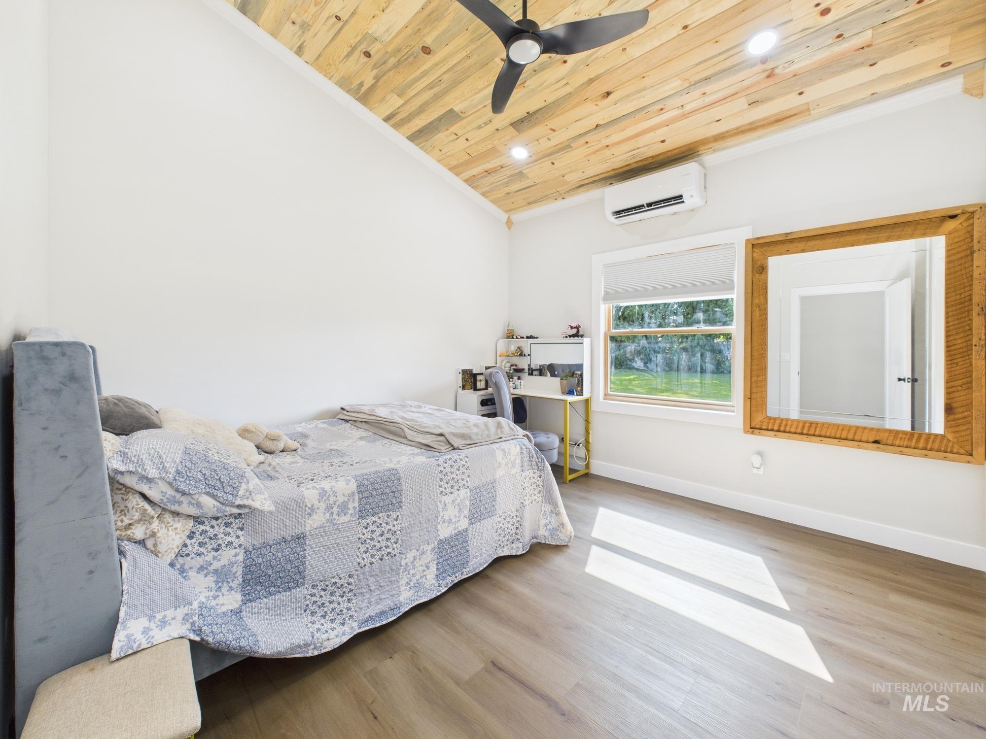 6501 Sweet Ola Highway Sweet, ID 83670 - Photo 22 of 43 Bedroom featuring wooden ceiling, ornamental molding, wood finished floors, recessed lighting, and ceiling fan