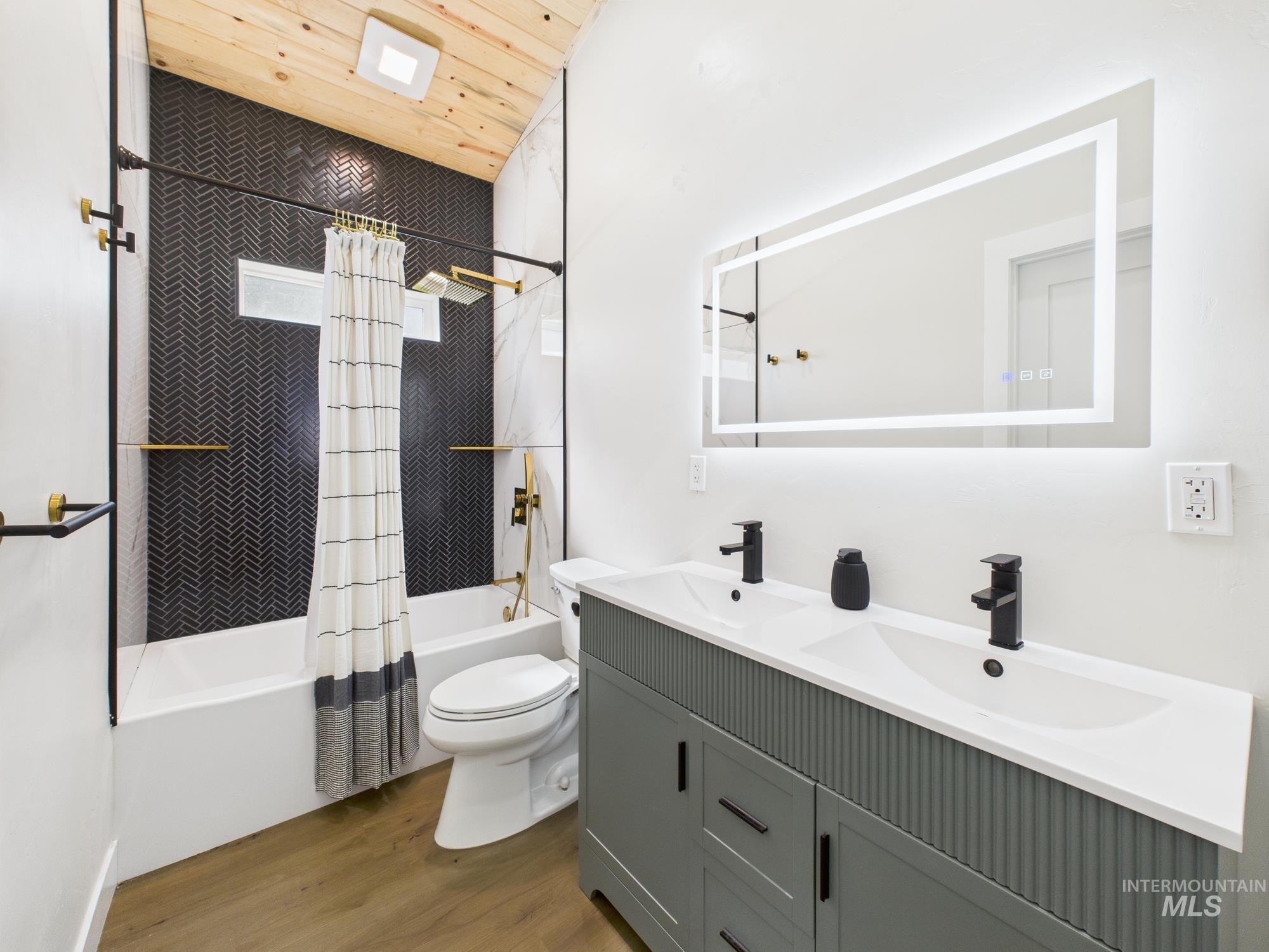 6501 Sweet Ola Highway Sweet, ID 83670 - Photo 24 of 43 Bathroom with shower / bath combination with curtain, double vanity, wood finished floors, and wood ceiling