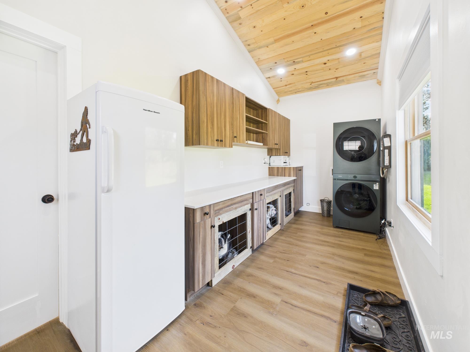 6501 Sweet Ola Highway Sweet, ID 83670 - Photo 25 of 43 Laundry area featuring estacked washer and dryer, wooden ceiling, light wood-style flooring, and recessed lighting
