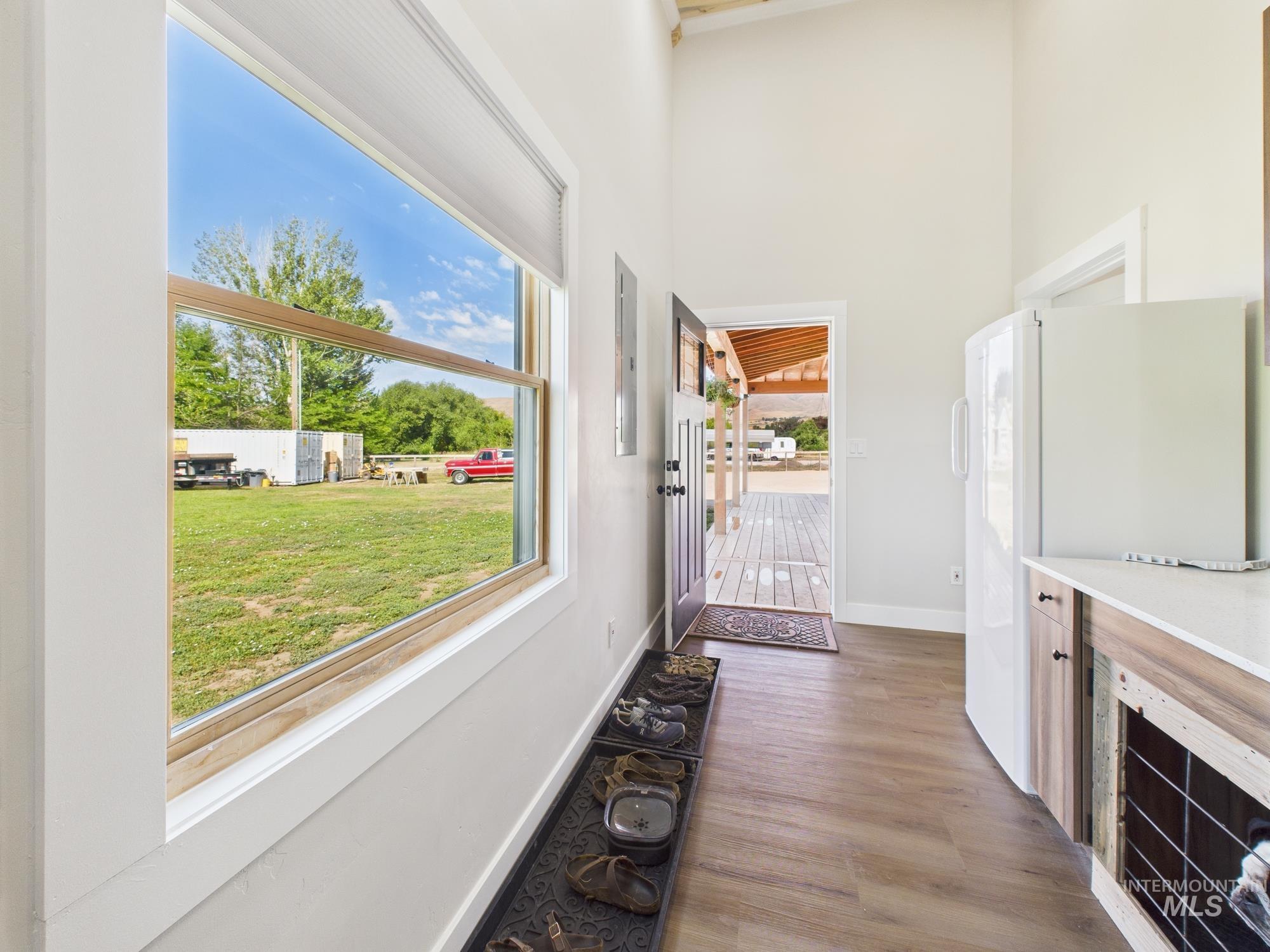 6501 Sweet Ola Highway Sweet, ID 83670 - Photo 27 of 43 Entryway featuring wood finished floors and a towering ceiling