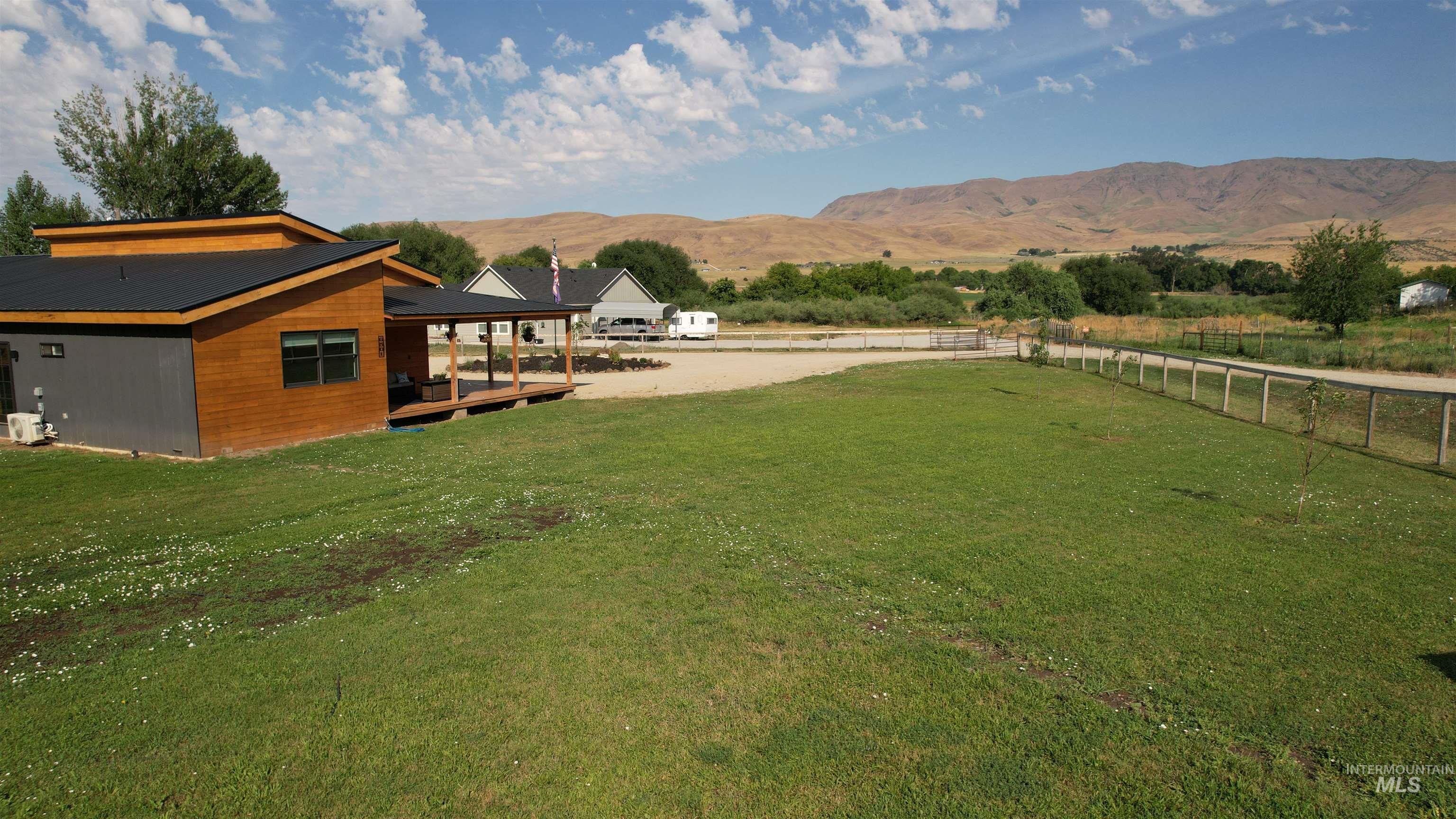 6501 Sweet Ola Highway Sweet, ID 83670 - Photo 35 of 43 View of yard with a view of countryside and a deck with mountain view
