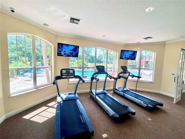 a view of a room with gym equipment