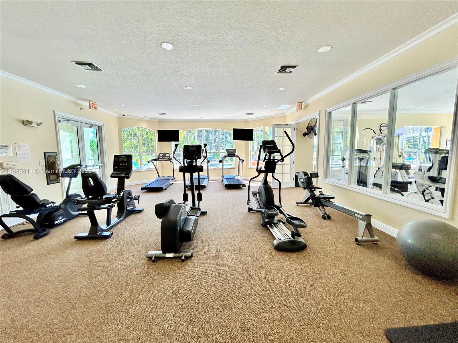 5080 Fairways Circle, Unit 307 Vero Beach, FL 32967 - Photo 26 of 27 a view of a room with gym equipment