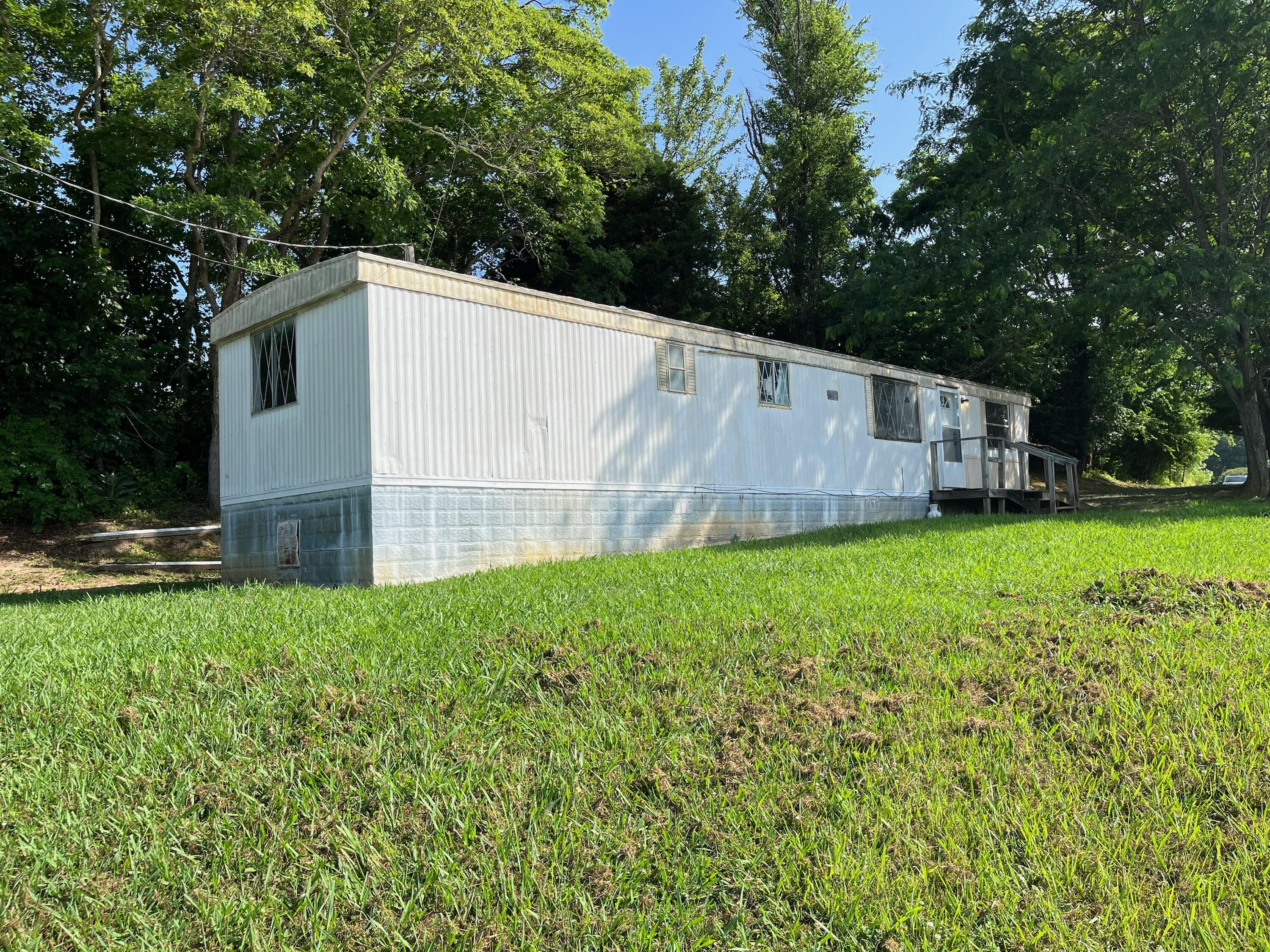 7735 Snapps Ferry Road Chuckey, TN 37641 - Photo 1 of 14 IMG_8665