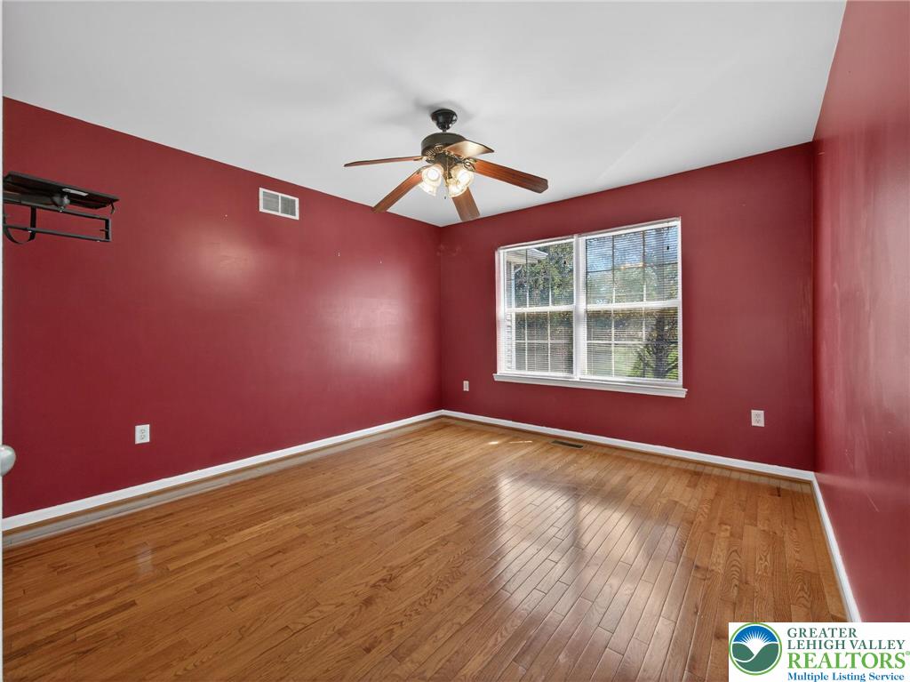 4312 Creek Road Allentown, PA 18104 - Photo 45 of 67 a view of empty room with wooden floor and fan