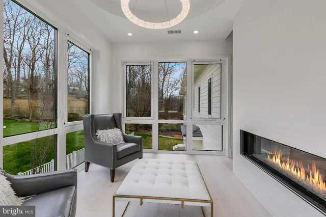 a living room with furniture and a gate