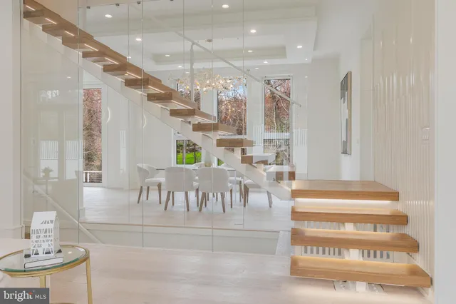 a view of entryway and hall with dining area
