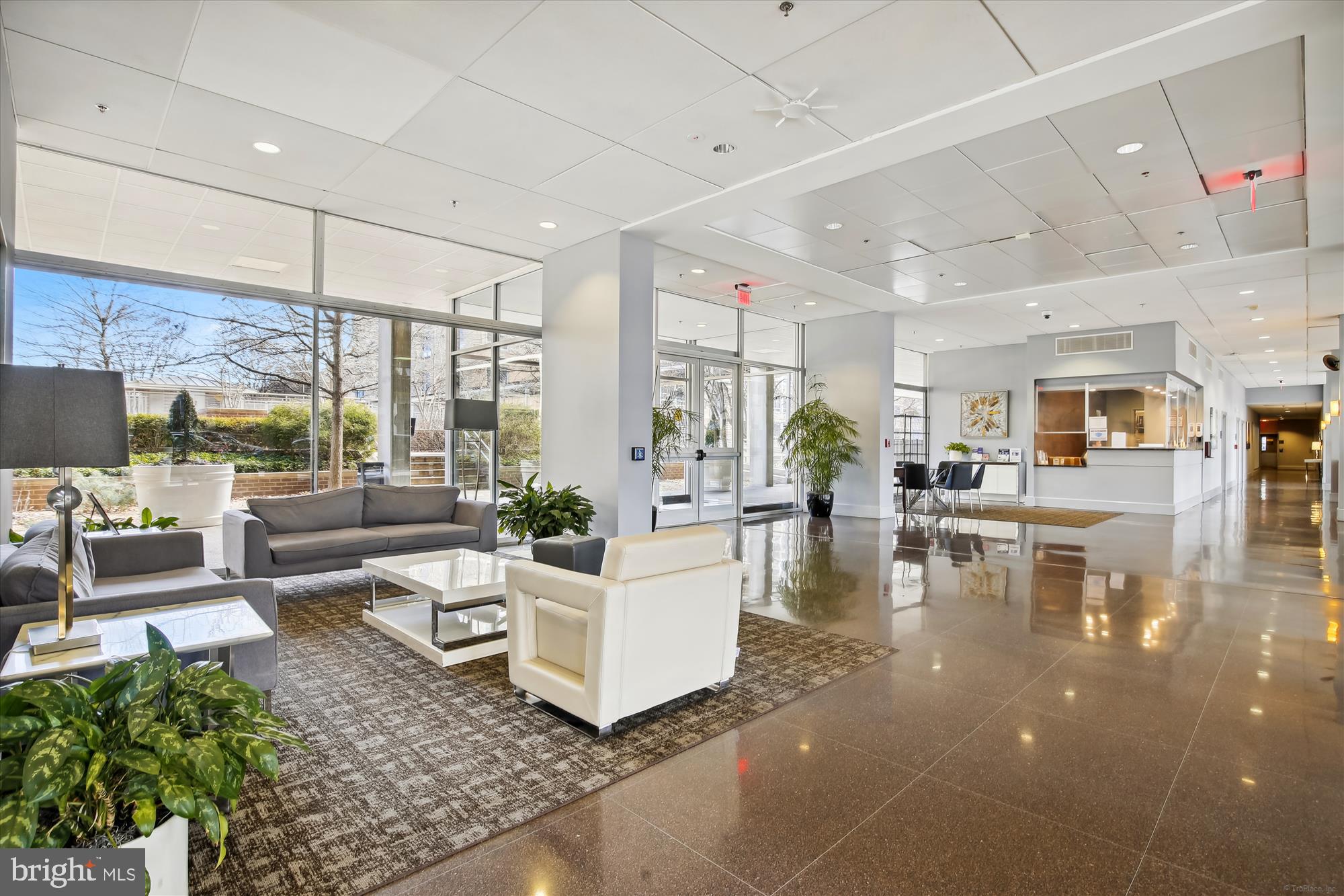 800 4th Street Southwest, Unit S113 Washington, DC 20024 - Photo 32 of 37 a living room with fireplace furniture and a large window