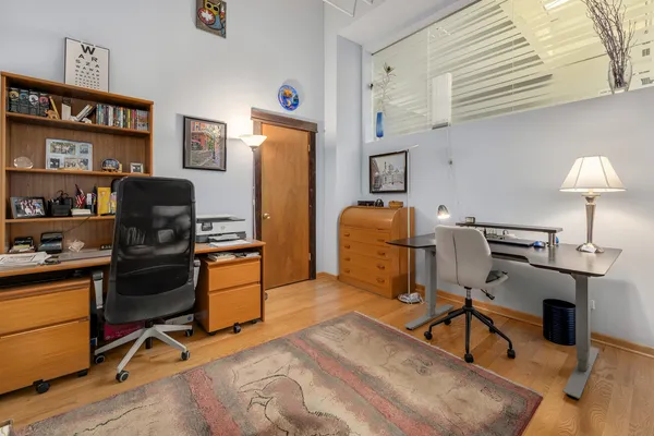a bedroom with furniture and a bed