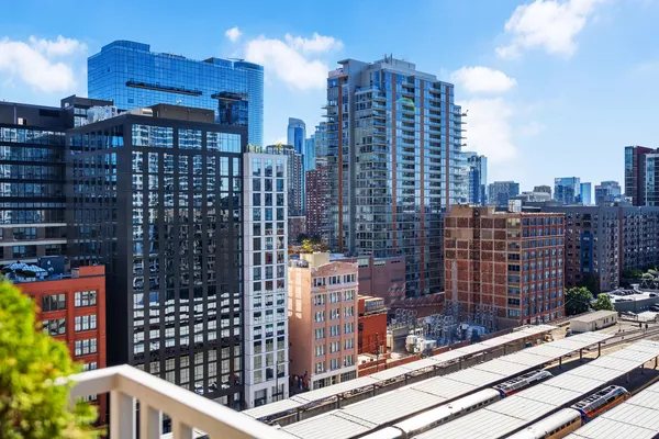 a city view with tall buildings