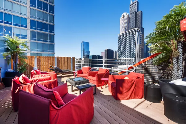 a outdoor space with tables and chairs