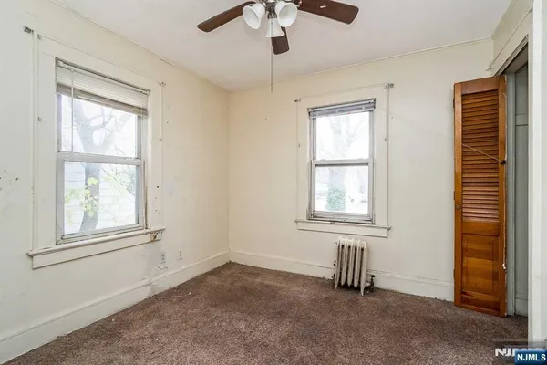 an empty room with windows