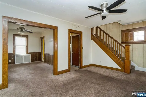 a view of a hallway with staircase