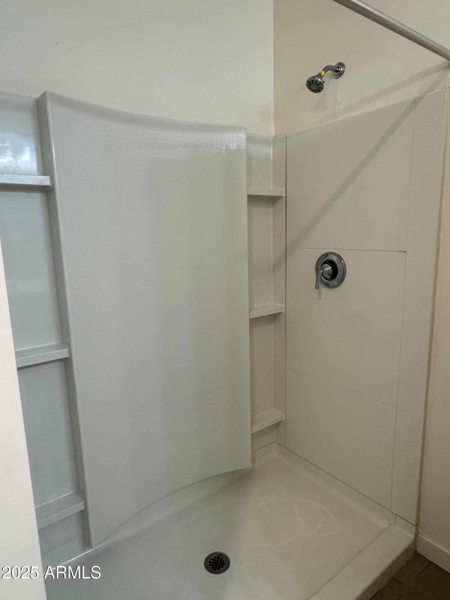 724 East Ruby Drive Casa Grande, AZ 85122 - Photo 17 of 20 a bathroom with a shower
