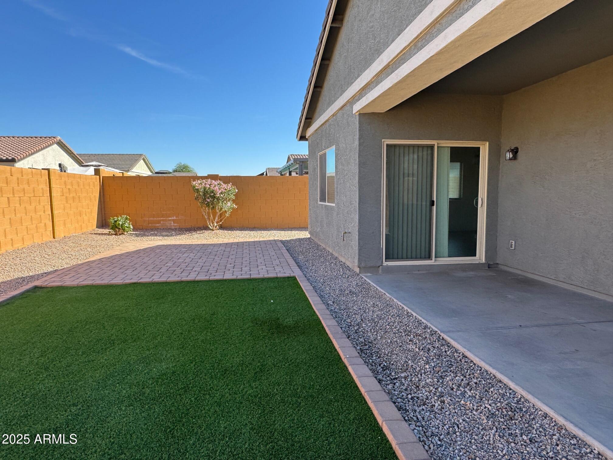 724 East Ruby Drive Casa Grande, AZ 85122 - Photo 19 of 20 a view of an house with backyard porch and kitchen