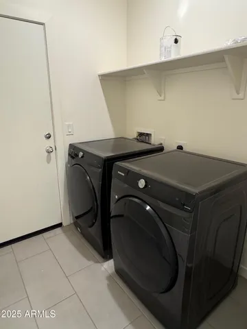 an empty room with closet area